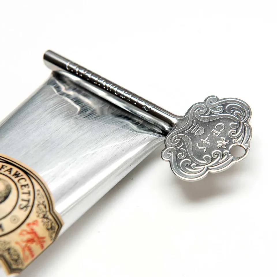 captain-fawcett-metal-tube-key-tubenaufroller-aus-edelstahl-f-r-restlose-entleer image 1
